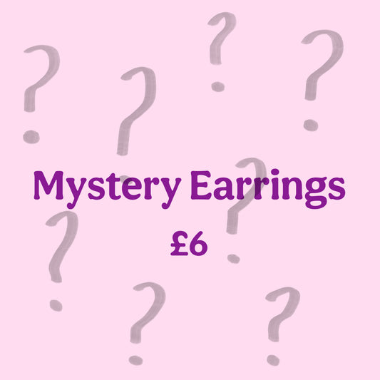 A Pair Of Mystery Earrings